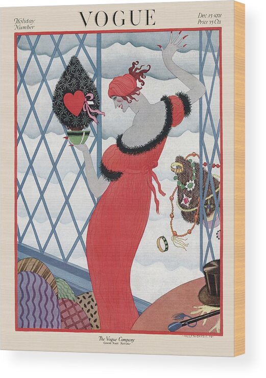 Illustration Wood Print featuring the painting Vogue Cover Featuring A Woman Holding A Christmas by Helen Dryden