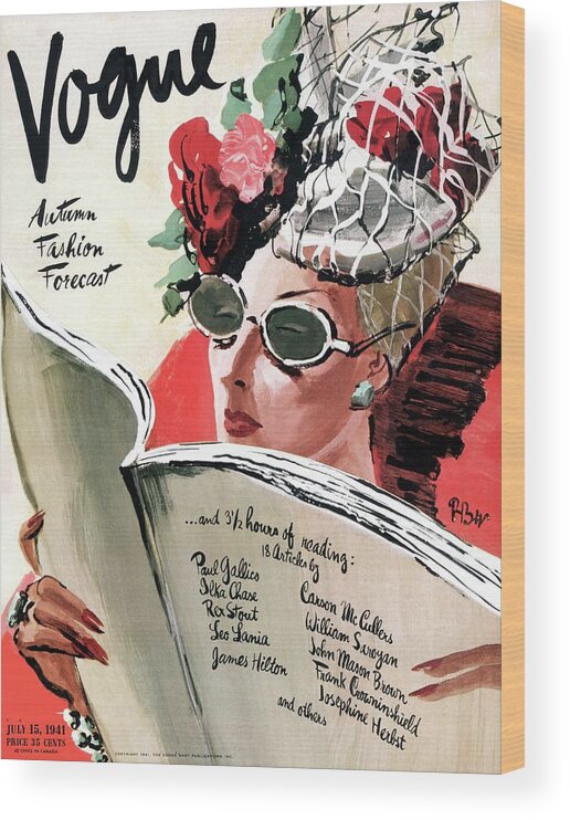 Fashion Wood Print featuring the photograph Vogue Cover Illustration Of A Woman Reading by Rene Bouet-Willaumez