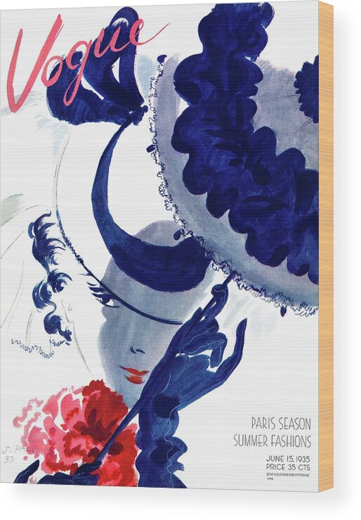 Illustration Wood Print featuring the photograph Vogue Magazine Cover Featuring A Woman Holding by Jean Pages