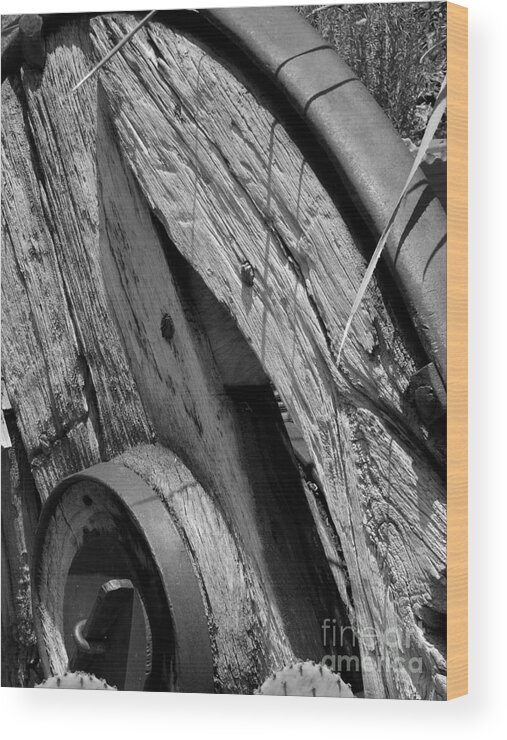 Black Wood Print featuring the photograph Black and white wagon wheel 1 by Christy Garavetto