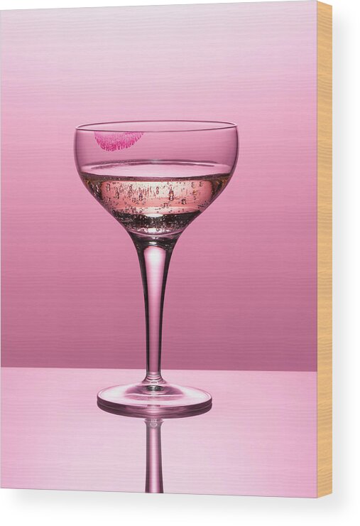 Temptation Wood Print featuring the photograph Close Up Of Pink Champagne In Glass #1 by Andy Roberts