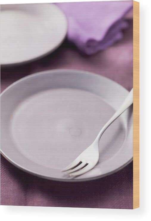 Ip_11176119 Wood Print featuring the photograph An Empty Plate With A Dessert Fork by Foodcollection