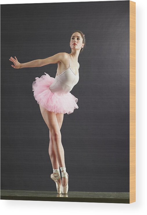 Ballet Dancer Wood Print featuring the photograph Ballerina On Point Looking Away by Blake Little