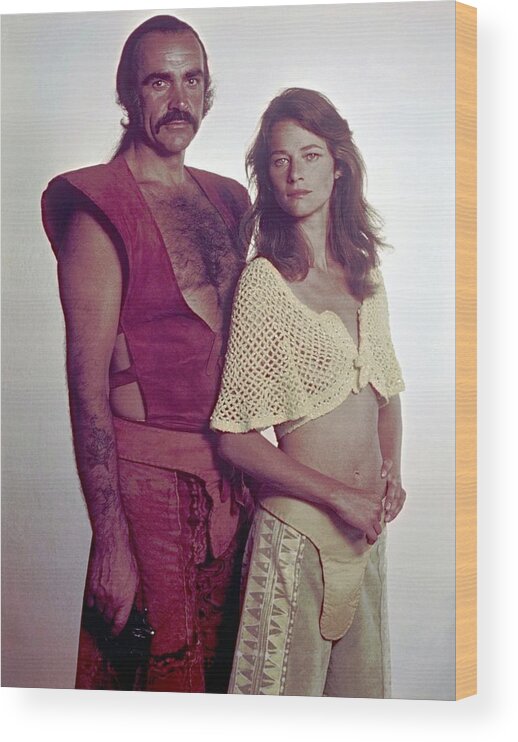 Charlotte Rampling Wood Print featuring the photograph SEAN CONNERY and CHARLOTTE RAMPLING in ZARDOZ -1974-. by Album