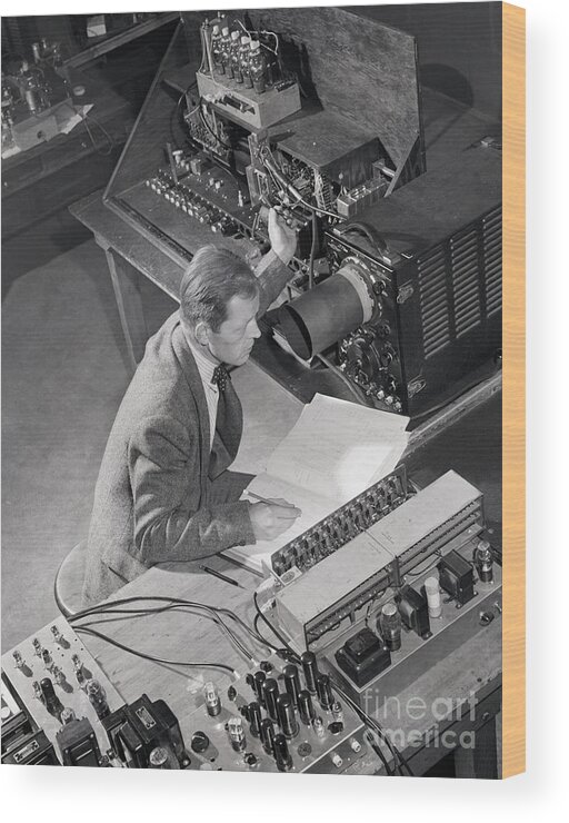 Working Wood Print featuring the photograph Technical Director Demonstrating Edvac by Bettmann
