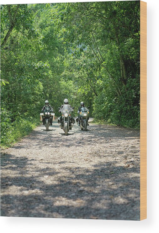 Crash Helmet Wood Print featuring the photograph Three Men Riding Motorbikes Along by Xpacifica