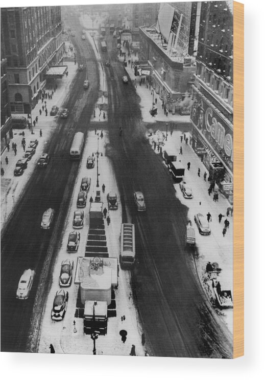 1950-1959 Wood Print featuring the photograph Times Square Covered In Snow In The by Keystone-france