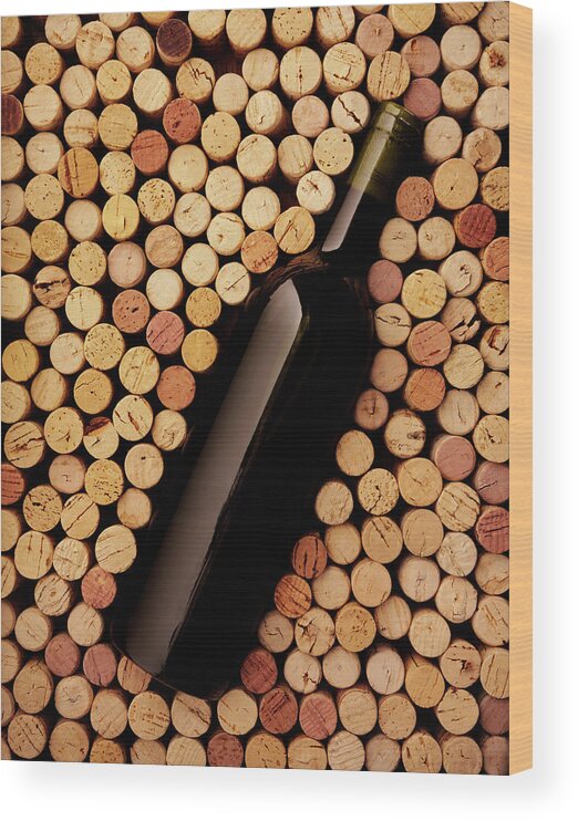 Alcohol Wood Print featuring the photograph Wine Bottle And Corks by Wragg