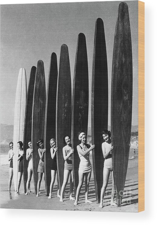 Child Wood Print featuring the photograph Women With Surf Paddleboards by Bettmann