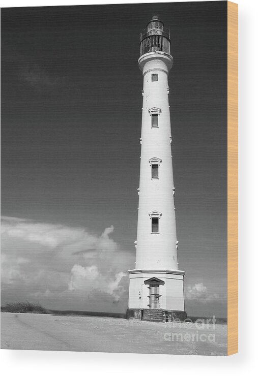 Lighthouse; California Lighthouse; Aruba; Blue; Beach; Rocks; Rock; Clouds; Cloud; Beach; Windows; Sky; Building; Remote; Black And White; Wood Print featuring the photograph Aruba California Light BW by Tina Uihlein