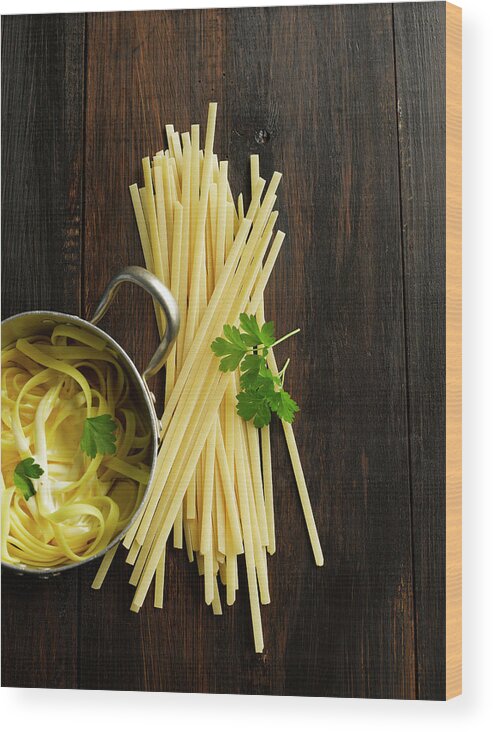 Italian Food Wood Print featuring the photograph Tagliatelle In Pot On Table #1 by Westend61