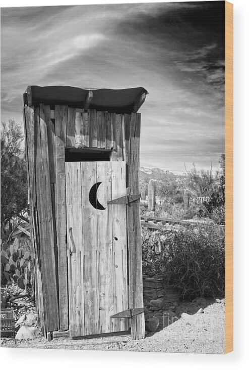 Black And White Wood Print featuring the photograph Desert Outhouse Under Stormy Skies by Lee Craig