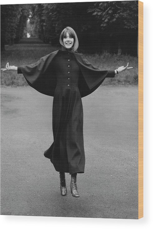 Fashion Wood Print featuring the photograph Francoise Hardy Wearing A Coat With A Small Cape by Arnaud de Rosnay