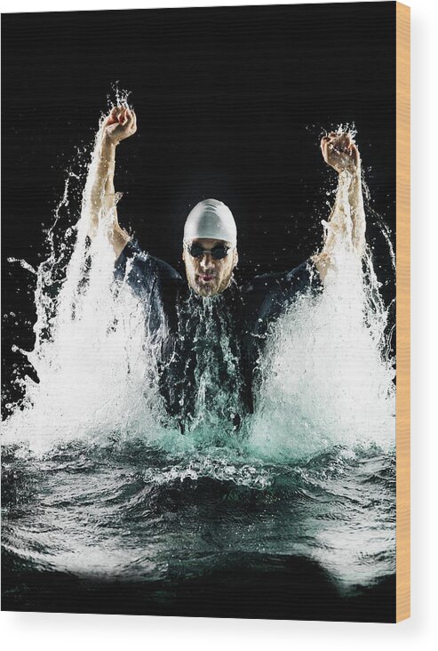 Human Arm Wood Print featuring the photograph Male Swimmer In Spray Of Water by Henrik Sorensen