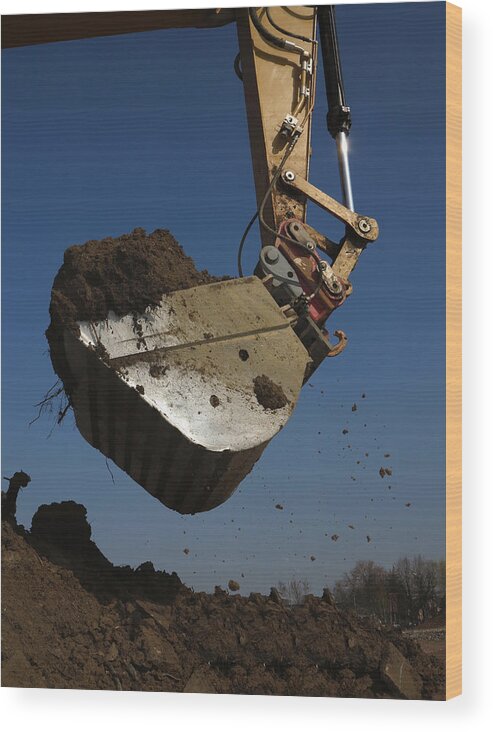 Construction Machinery Wood Print featuring the photograph Mechanical Digger Excavating On A by Rolfo Rolf Brenner