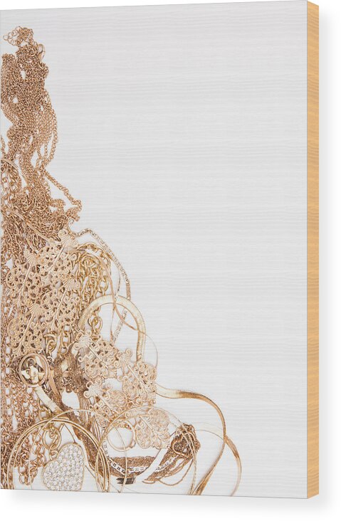 White Background Wood Print featuring the photograph Studio Shot Of Gold Jewelry by Vstock Llc