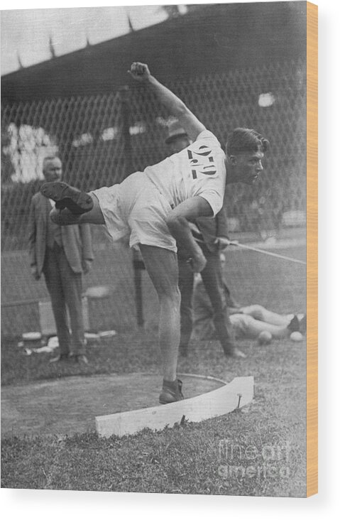 The Olympic Games Wood Print featuring the photograph Clarence Houser Shotput Gold Medalist by Bettmann