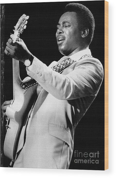 Concert Wood Print featuring the photograph George Benson Playing Guitar On Stage by Bettmann