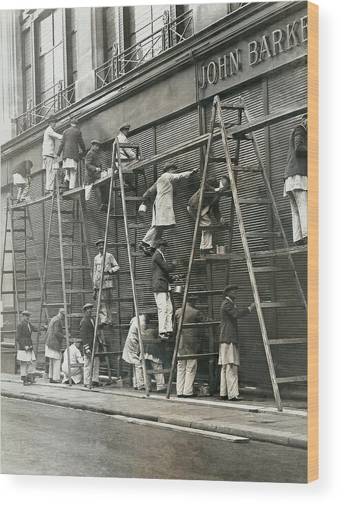 Photography Wood Print featuring the photograph Group Of Painters On Ladders by Digital Vision.