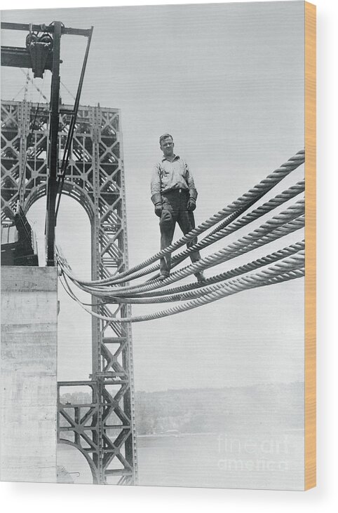 Civil Engineering Wood Print featuring the photograph James Bowers Standing On Bridge Cables by Bettmann