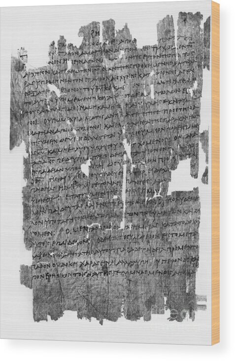 Ancient Wood Print featuring the photograph Papyrus Roll With Epistle To The Hebrews by Bettmann