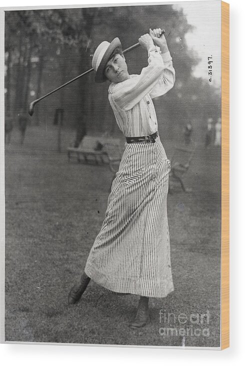 People Wood Print featuring the photograph Woman In Middle Of Golf Swing by Bettmann