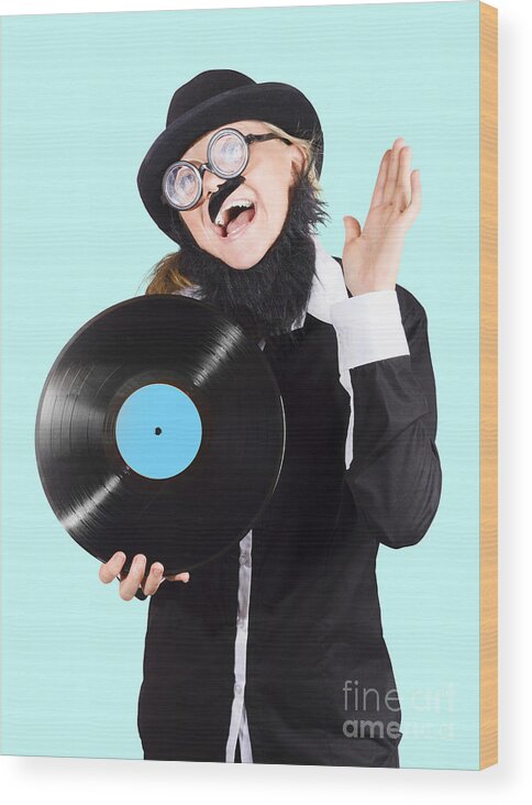 Record Wood Print featuring the photograph Crazy DJ rocking out with vinyl record by Jorgo Photography