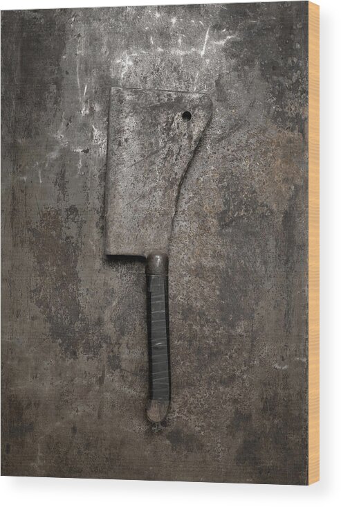 Single Object Wood Print featuring the photograph Meat cleaver on metal background, overhead view by Jonathan Kantor