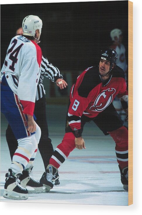 National Hockey League Wood Print featuring the photograph Odelein fights Peluso by R Laberge