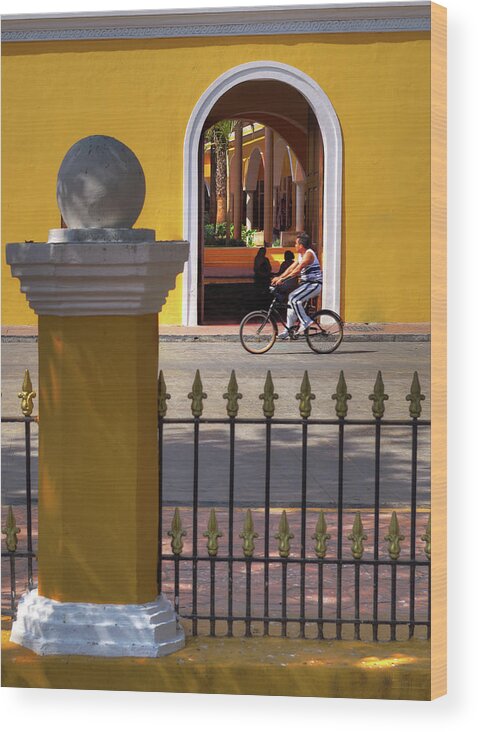 Valladolid Wood Print featuring the photograph Valladolid Colors - street scene with bicyclist and yellow architecture by Peter Herman