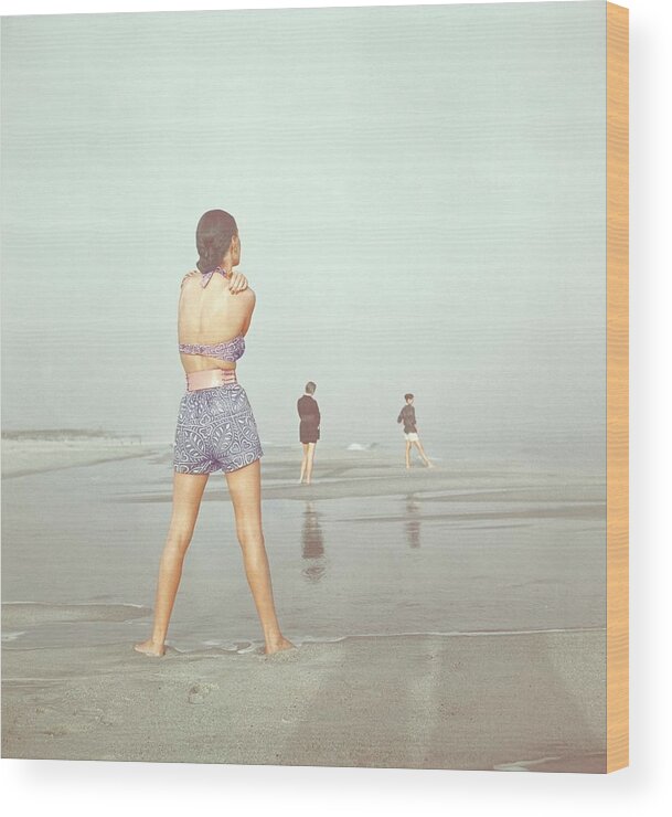 Fashion Wood Print featuring the photograph Back View Of Three People At A Beach by Serge Balkin