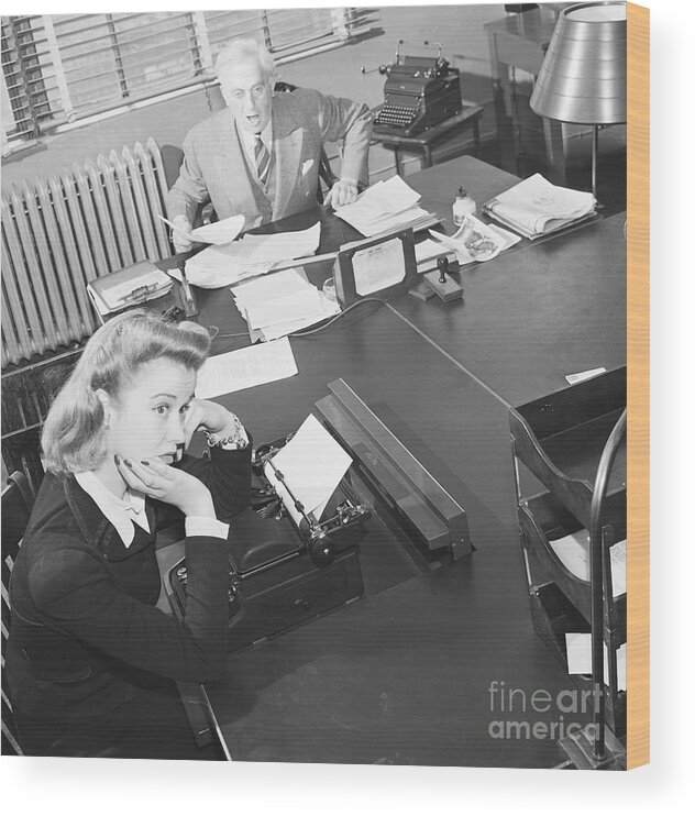 Corporate Business Wood Print featuring the photograph Boss Yelling At His Secretary In Office by Bettmann