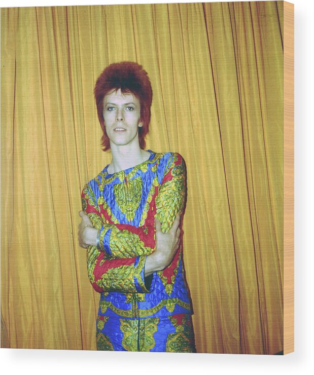 Ziggy Stardust - Persona Wood Print featuring the photograph Bowie As Ziggy Stardust In Ny by Michael Ochs Archives