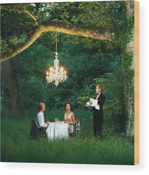 People Wood Print featuring the photograph Butler Waiting On Young Couple Dining by Martin Barraud