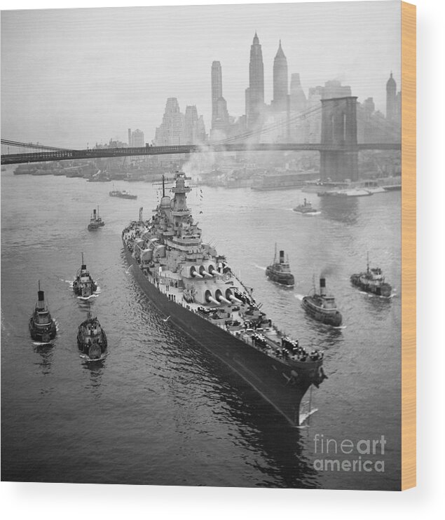 Brooklyn Navy Yard Wood Print featuring the photograph Uss Missouri Sailing Under Bridge by Bettmann