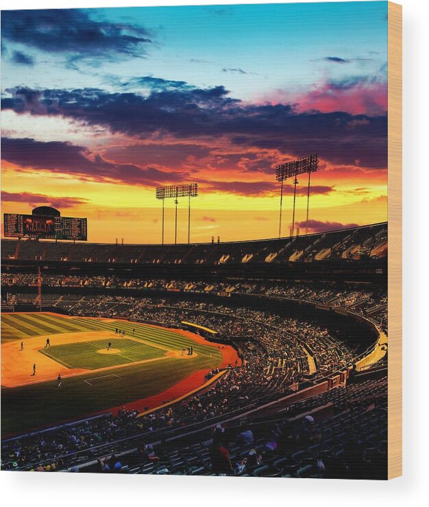 Oakland Wood Print featuring the digital art The Oakland-Alameda County Coliseum in sunset light by Nicko Prints