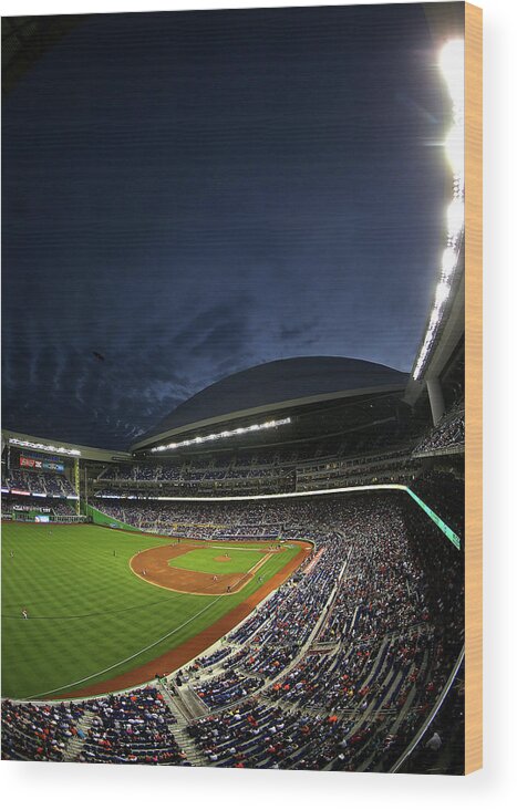 American League Baseball Wood Print featuring the photograph Colorado Rockies V Miami Marlins by Mike Ehrmann