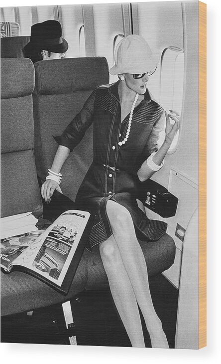 Accessories Wood Print featuring the photograph A Model Looks Wearing Abe Schrader On An Airplane by Chris von Wangenheim
