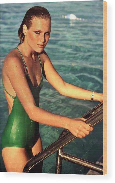 Fashion Wood Print featuring the photograph Patti Hansen Wearing A Green Swimsuit by Arthur Elgort