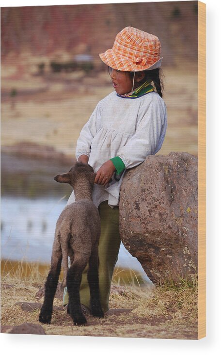 Girl Wood Print featuring the photograph Sillustani Girl with hat and lamb by RicardMN Photography