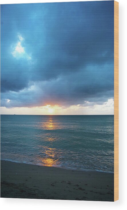 Water's Edge Wood Print featuring the photograph Stormy Clouds Seascape At Sunset by Jaminwell