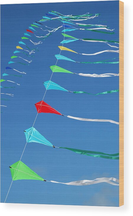 Barmouth Wood Print featuring the photograph String of Kites by Rob Huntley