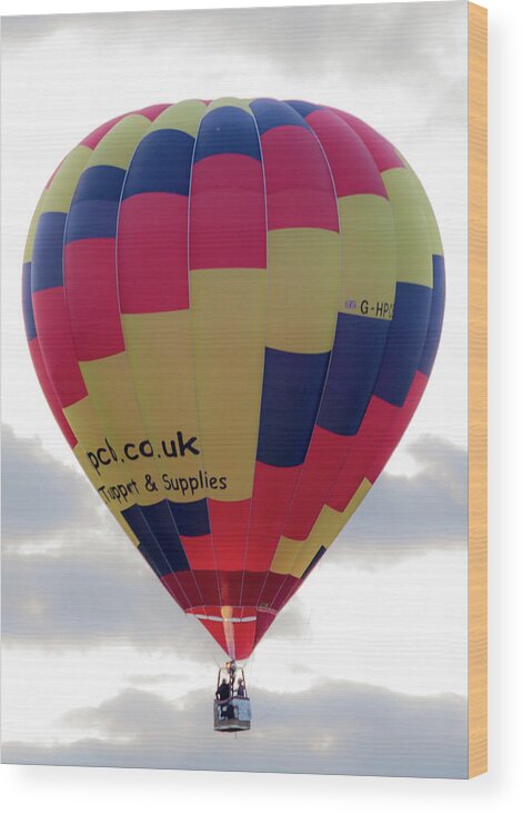 Aerial Wood Print featuring the photograph Blue, Red and Yellow Hot Air Balloon by Scott Lyons