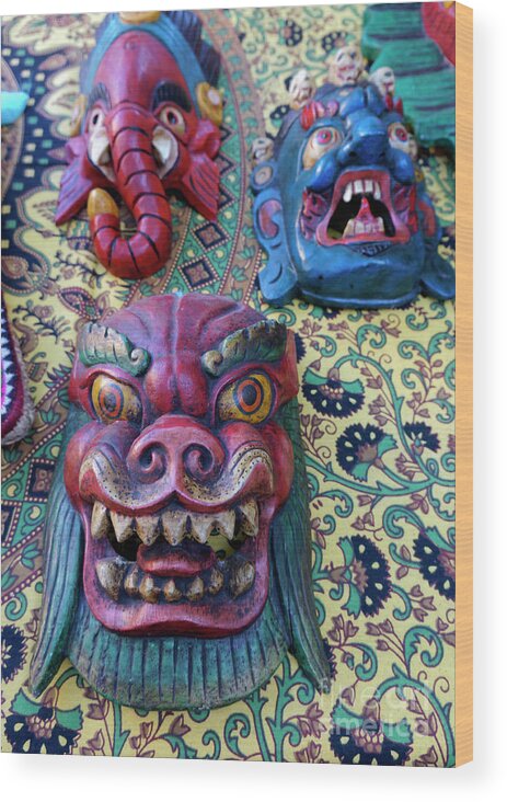 Nepal.nepalese Wood Print featuring the photograph Colorful Nepalese Masks by John Mitchell