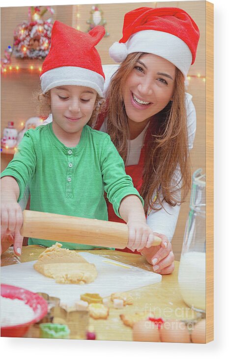 Baby Wood Print featuring the photograph Mother with son doing Christmas cookies by Anna Om