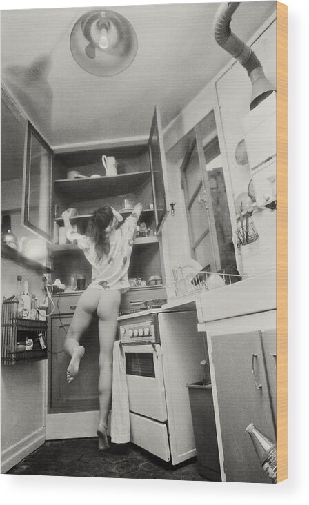 Photography Wood Print featuring the photograph Running through the kitchen by Philippe Taka