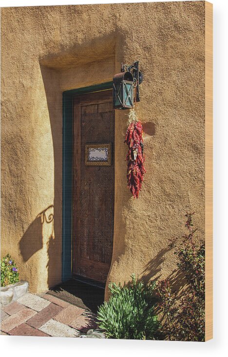 New Mexico Wood Print featuring the photograph Santa Fe Door with Hanging Red Chile Peppers by Roslyn Wilkins