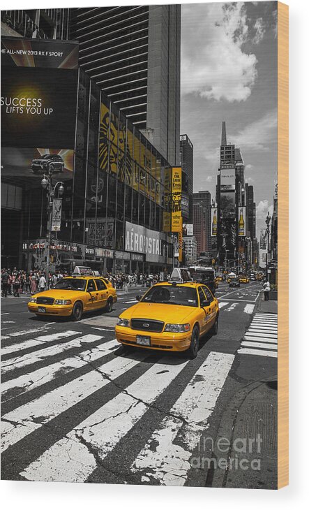Manhattan Wood Print featuring the photograph Yellow Cabs cruisin on the Times Square by Hannes Cmarits
