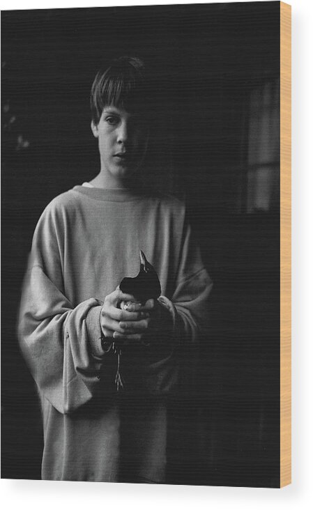 Bird Wood Print featuring the photograph Boy With A Bird by Anders Ludvigson