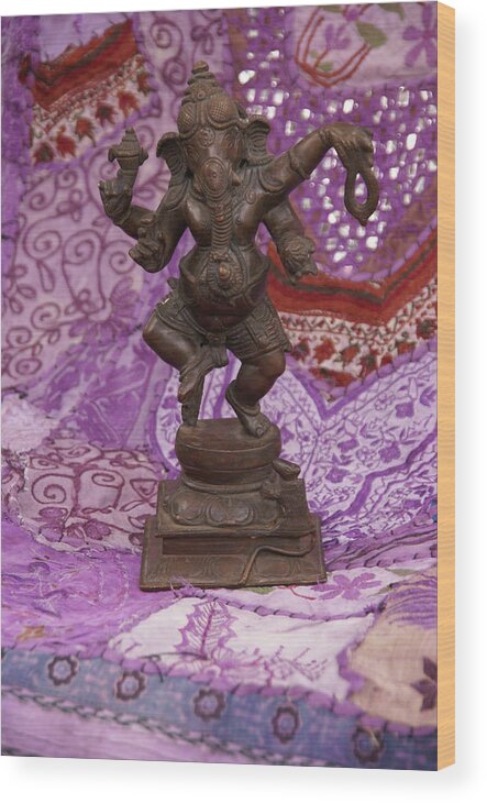 Ganesh Wood Print featuring the photograph Bronze Ganesha dancing, on purple by Steve Estvanik